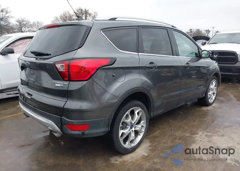 2019 Ford Escape Titanium z USA, uszkodzony, nr VIN 1FMCU9J92KUB65624
